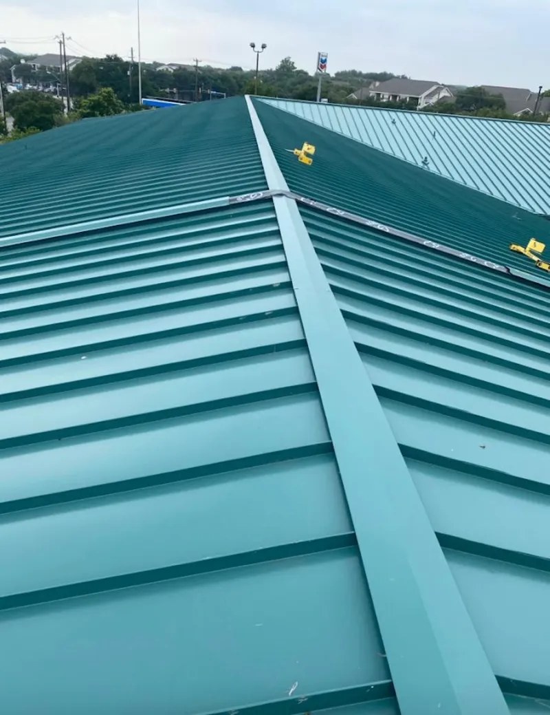 Green commercial metal roof ridge and valley for Metal Roof Repair in Wilsonville